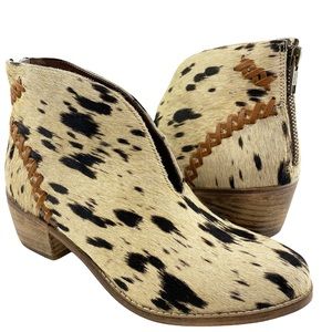 Naughty Monkey leather ankle bootie cow print. Size 9.5